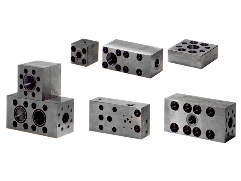 Manifold blocks for hydraulic servo cylinders